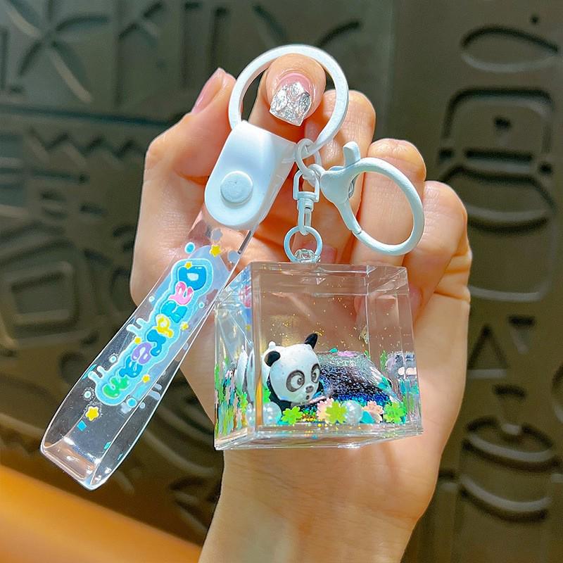 Exquisite Quicksand Panda Keychain: Cartoon Oil-Filled Doll Bag Pendant and Car Accessory