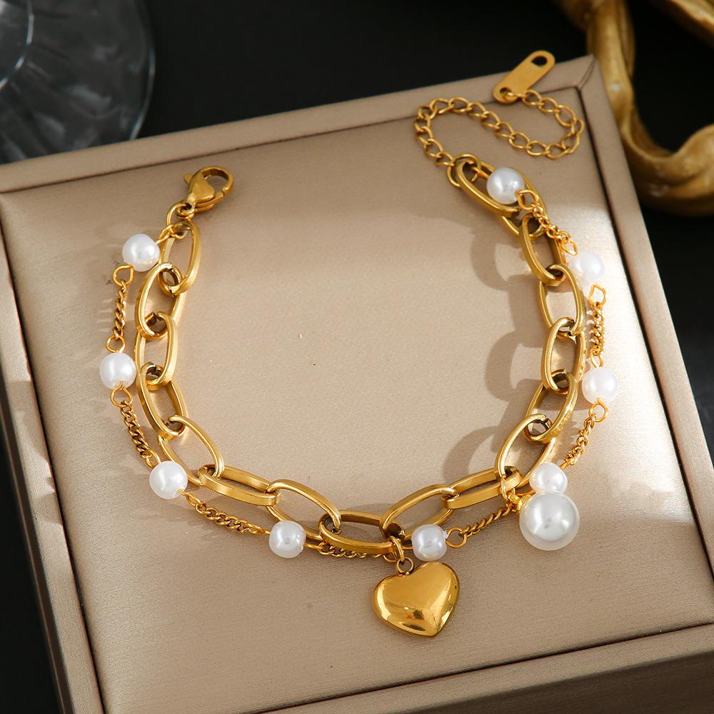 Luxe Titanium Staal Vierbladig Klaver Armband in Koreaanse Stijl met Ingelegde Diamanten voor Vrouwen - Kleurvast