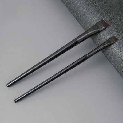 Feifei Wang's Dual-Ended Eyeliner and Eyebrow Brush - Perfect for Makeup Application.