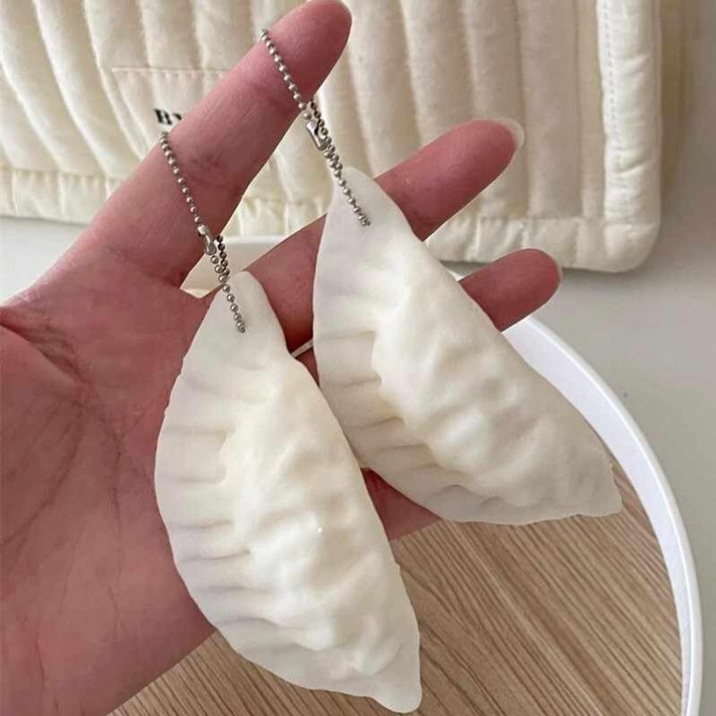 1-5pcs Creative Dumpling Kneading Music Relieving Toy Keychains Creative Food Play Venting Prank Toy Pendants