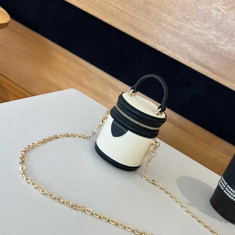 

2025 Новая женская сумка из натуральной кожи, цилиндрическая вертикальная мини-сумка-ведро для ланча, сумка для наушников на цепочке, косметичка, партия из трансграничной партии 10x8CM