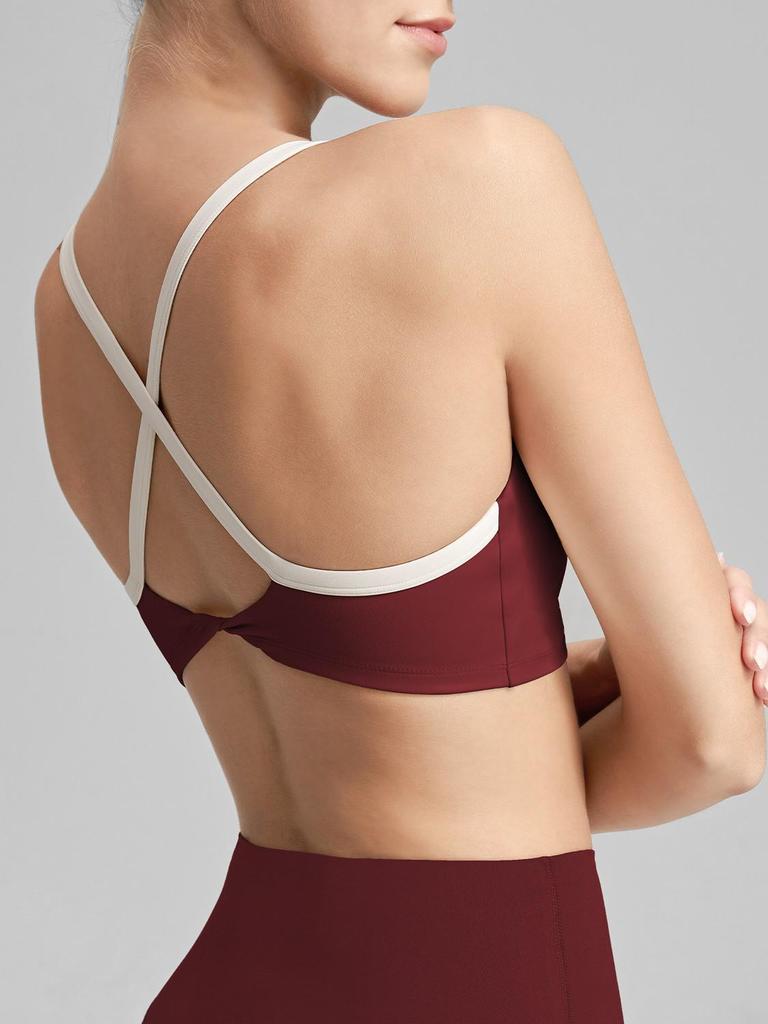 Women's Cross-Back Sports Bra: Sexy, Stylish Design for Pilates, Fitness, and Yoga, with Fixed Cups and Thin Straps for Outdoor Wear.
