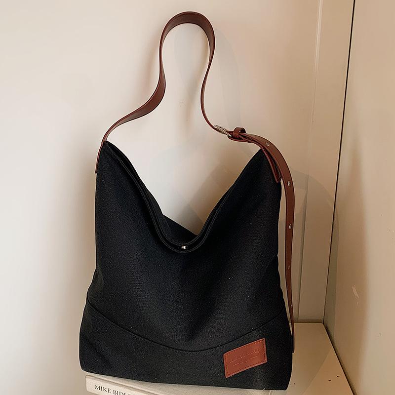 Canvas Bag Women's Large Capacity 2025 Summer New Simple Shoulder Bag Leisure Student Class Commuter Tote Bag