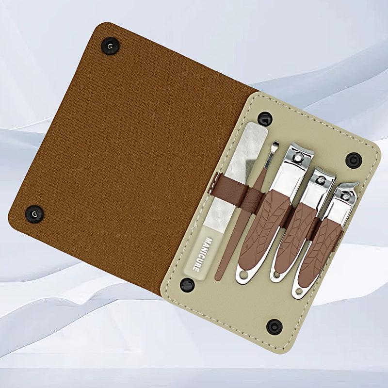 Stainless Steel Manicure Set: Nail Clippers, Cuticle Pusher, Ear Pick, File.
