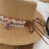 New original ethnic style straw hat women's spring and summer beach outing sun hat retro straw woven sun protection hat