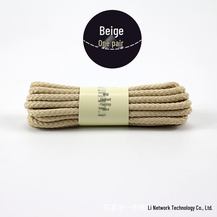 Martin Høy-Topp Militærstøvler i Skinn: Britisk hverdagsklær med runde svarte og hvite skolisser.