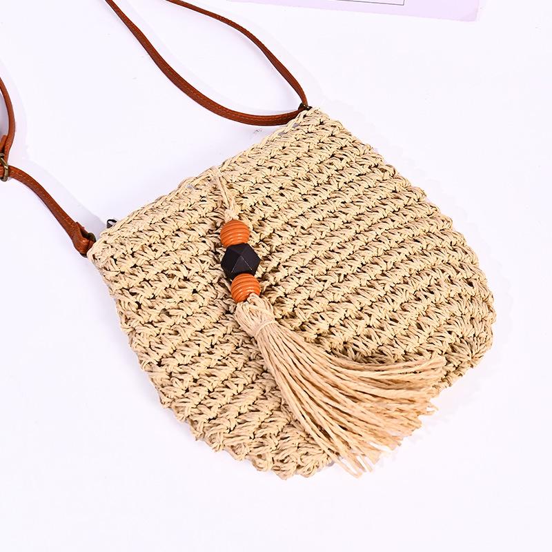

New summer woven bags, women s straw-woven exquisite fringed oblique span shoulder bag, simple seaside beach bag One Size