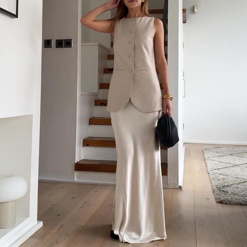 

Европейский и американский женский летний модный комплект 2025: Топ без рукавов с круглым вырезом и юбка с высокой талией. M абрикосовый