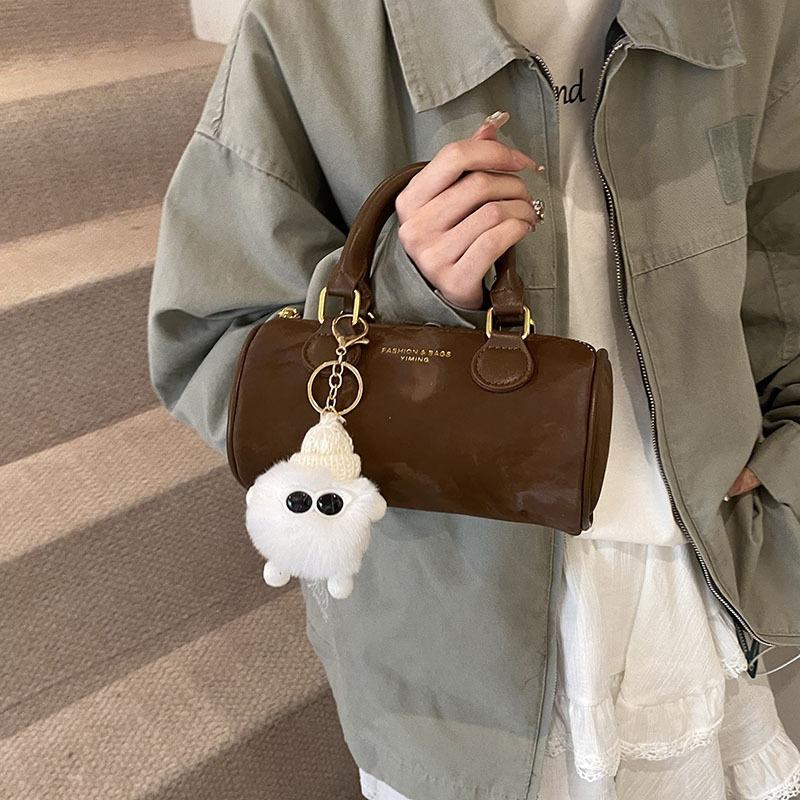 Small bags are popular today, women's new spring and summer versatile messenger bags, handbags, cylindrical bags.