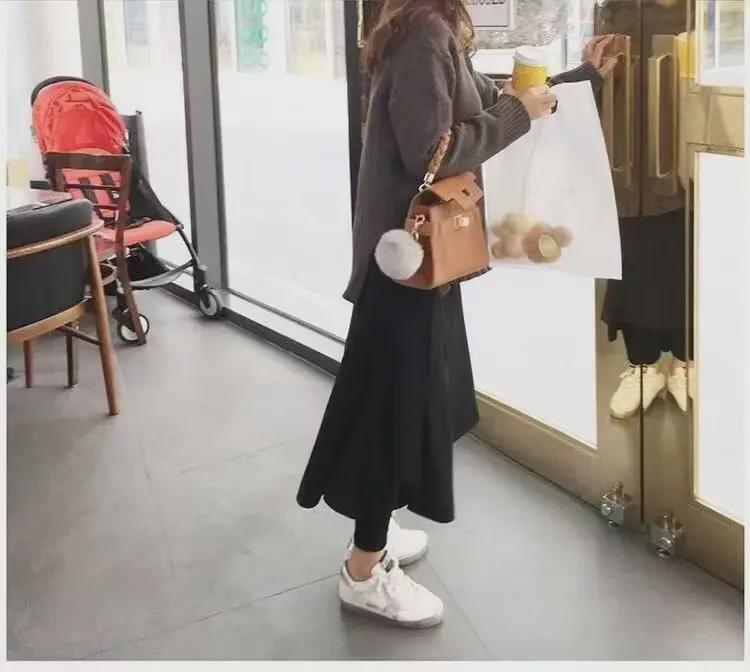 Unregelmäßige mehrlagige Rockhose für Damen Herbst/Winter 2023 – Nischendesign, große Größe, falscher zweiteiliger Stil.