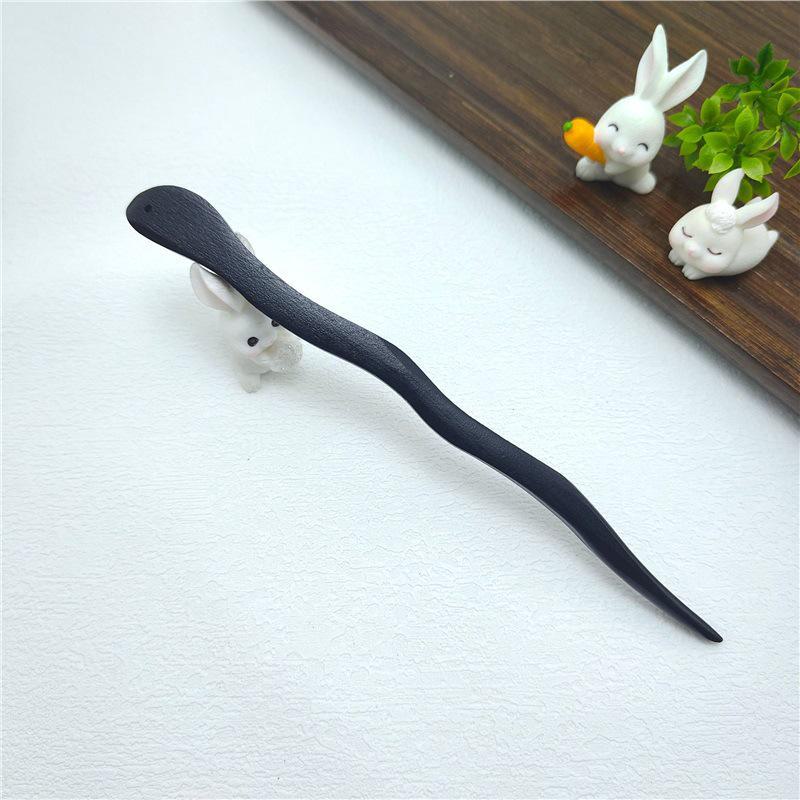 

Элегантная шпилька из черного дерева: Современная простота в сочетании с древним китайским стилем 7