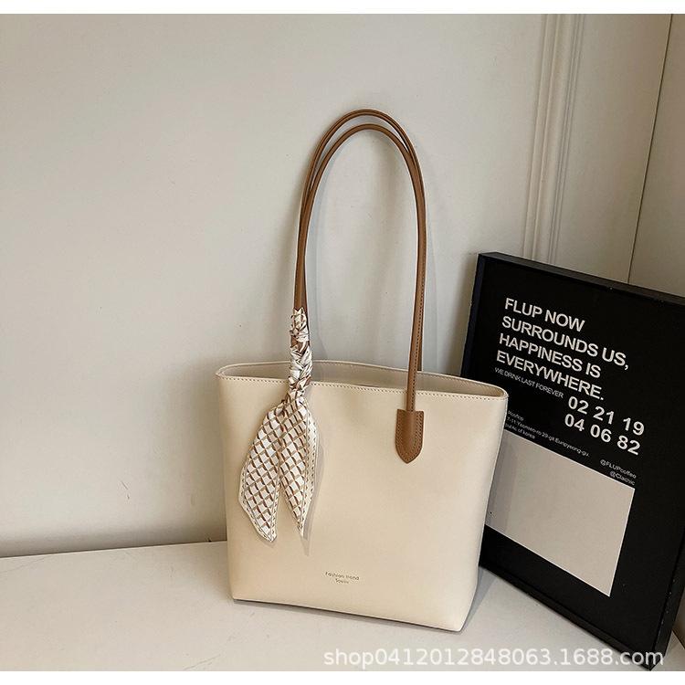 

New women s bags, large-capacity tote bags, high-end textured shoulder bags, women s armpit bags, practical hand-carried shopping bags.