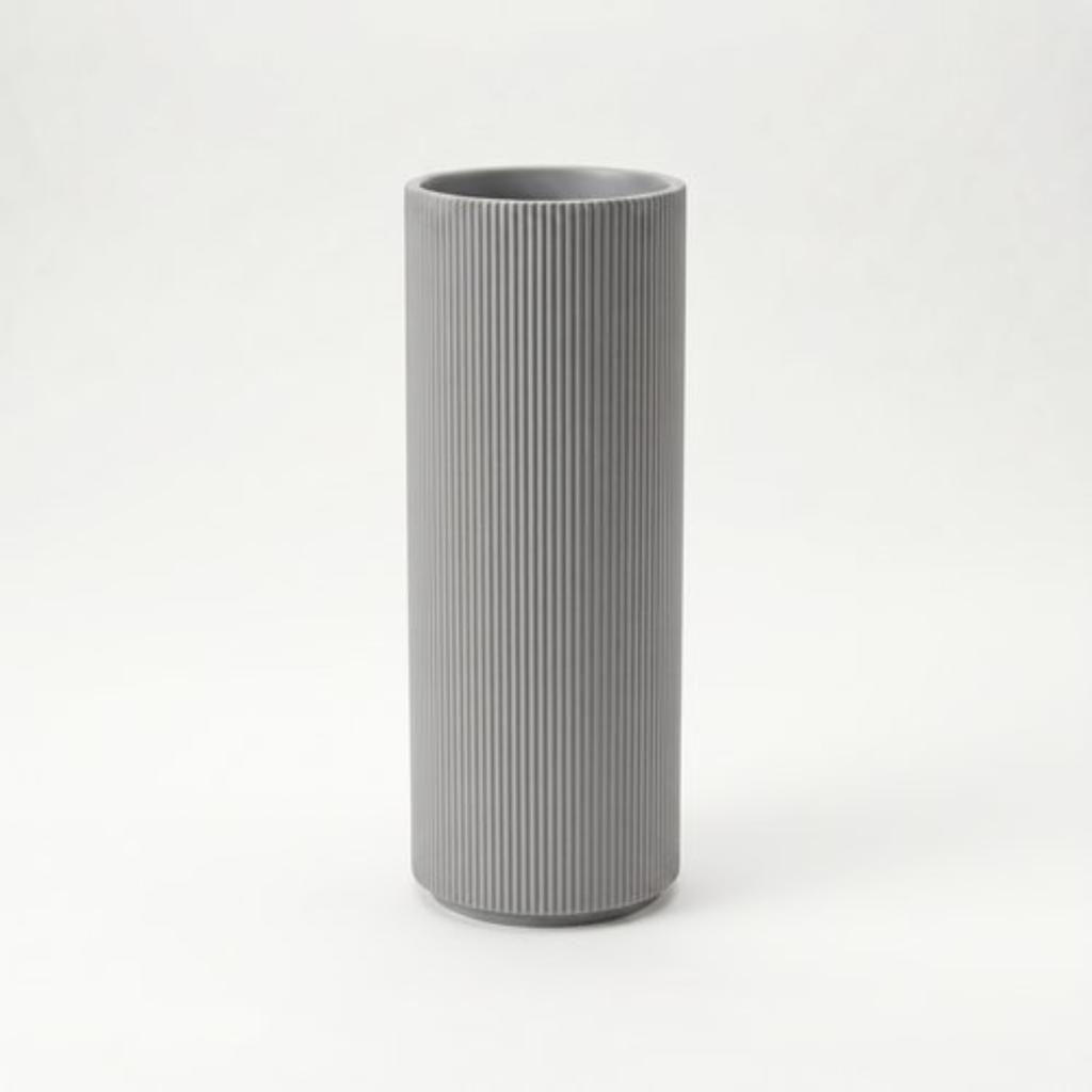Decorative cylindrical gray vase for flowers, classic shape, elegant