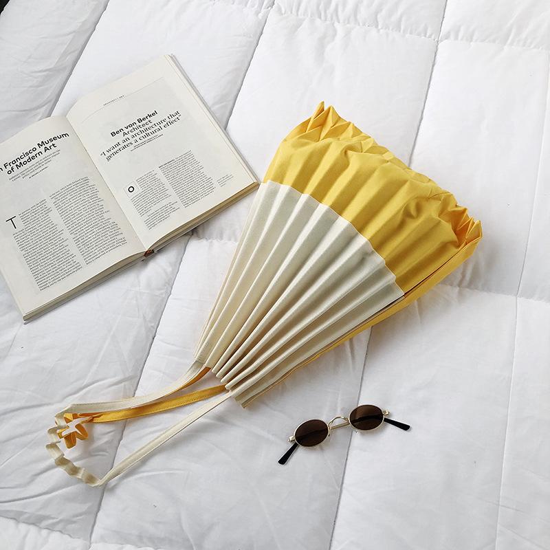 

Japanese pleated fan bag canvas beach bag shopping bag versatile shoulder bag women s Handong gate fashion pleated bag жёлтый