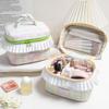 Korean-style niche design twisted handle makeup bag with large capacity pleated lace storage bag, color-blocked plaid wash bag.