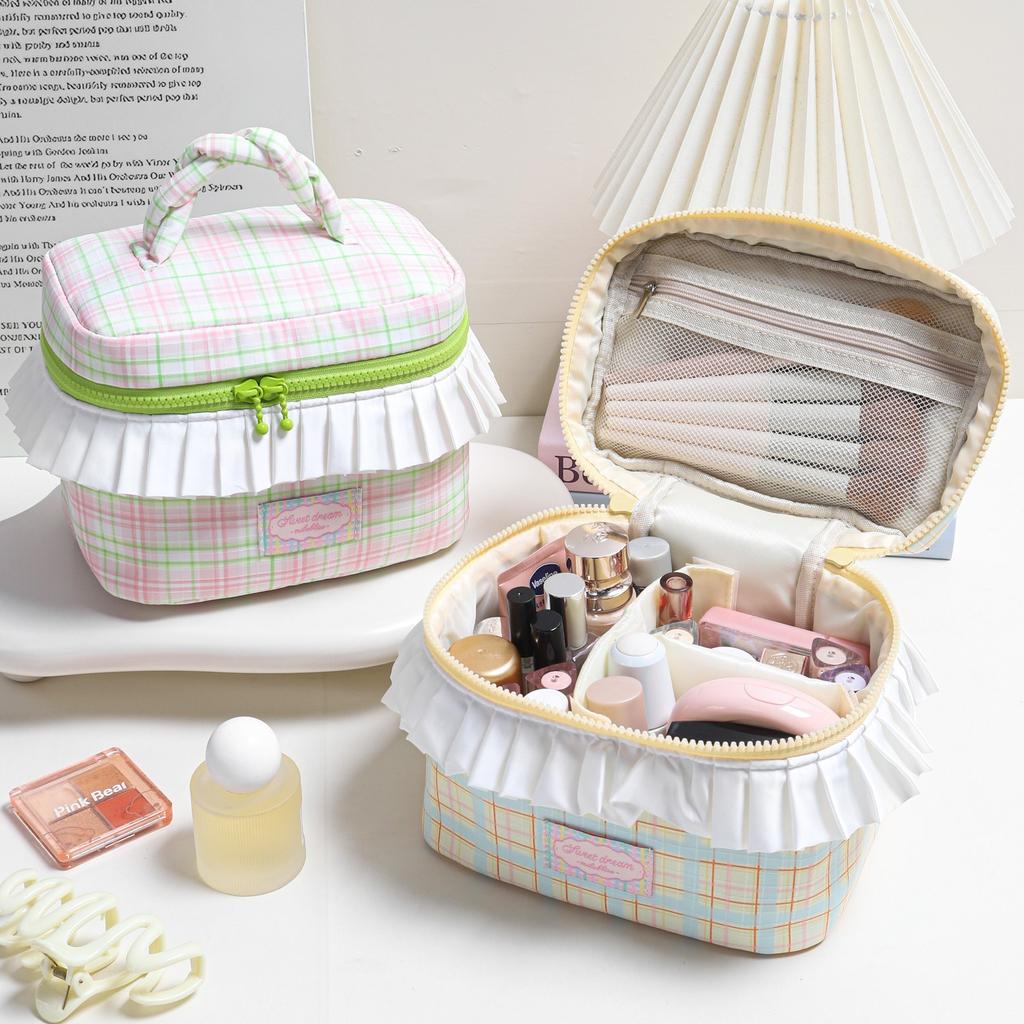 Korean-style niche design twisted handle makeup bag with large capacity pleated lace storage bag, color-blocked plaid wash bag.