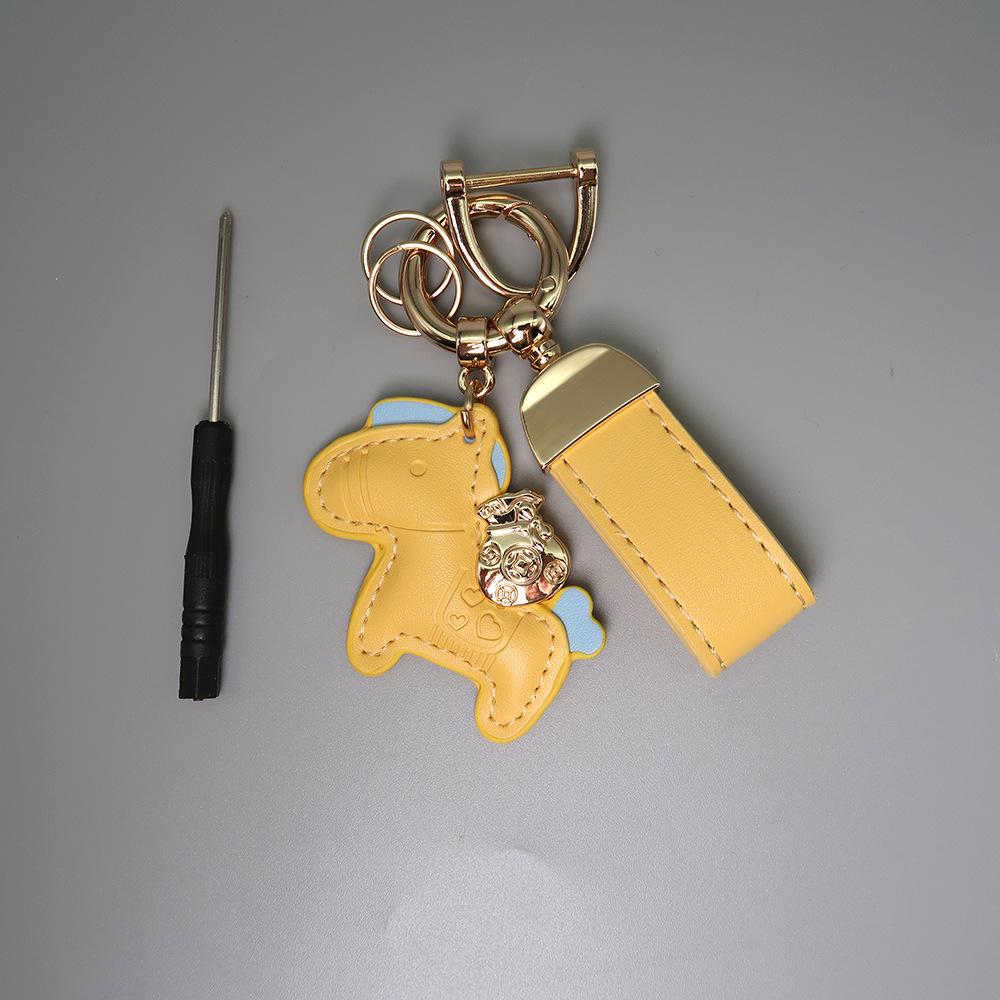 Instant Wealth Leather Keychain with Cartoon Pony Pendant for Couples – Trendy Bag and Car Accessory