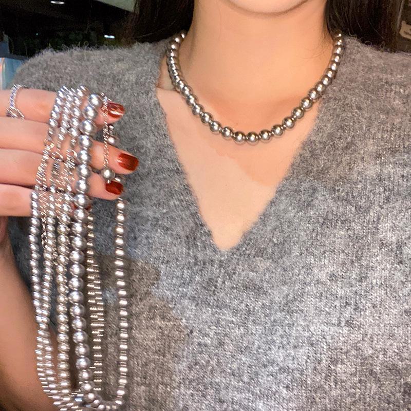 "Collar de perlas grises de cáñamo Zhenduo: Accesorio versátil para suéter con cadena de clavícula