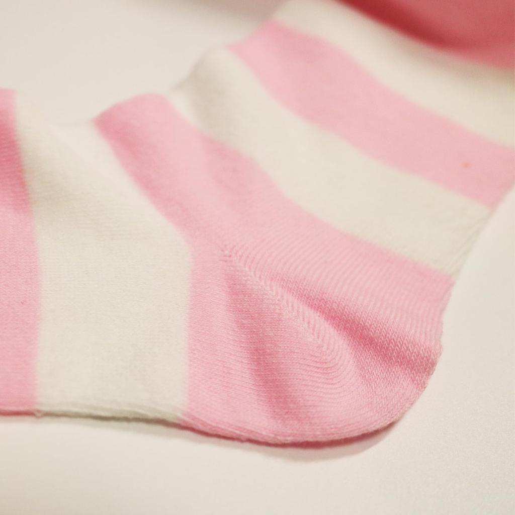1 par de calcetines altos a rayas navideñas/rosa blanco