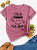 Es ist ein T-Shirt für Damen - Süße Wortspiel-Grafik, Lässiges Lila Oberteil