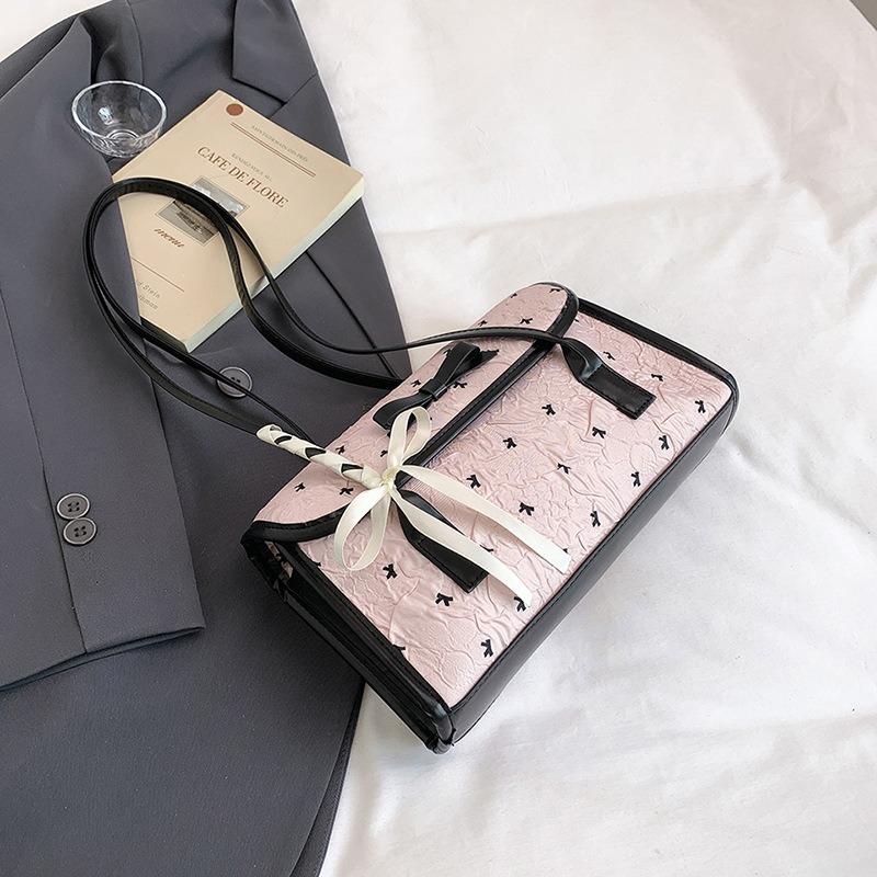 

Black pink contrasting color bow small bag women s summer new shoulder underarm bag fashionable and sweet hand bag