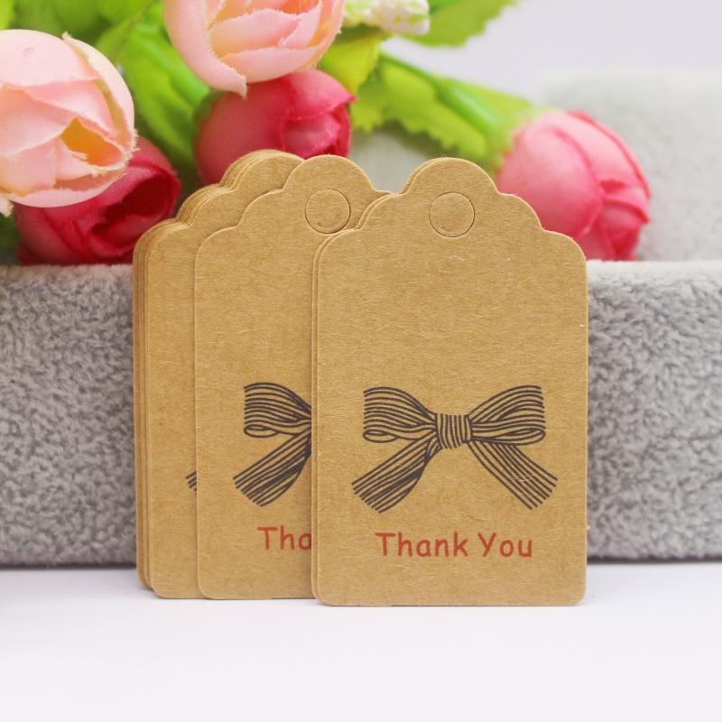 100 szt. + 100 sznurków 3x5 cm biały/papier kraft. Dziękujemy za ręczne wykonanie zawieszki do etykiety