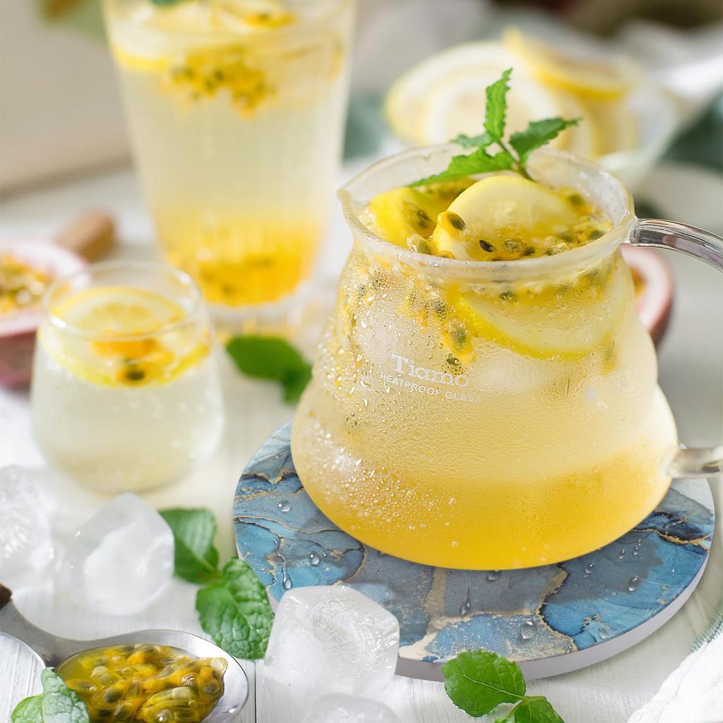 HAOCOO Stylish Ceramic Coasters with Marble Pattern and Cork Backing, Round, Set of 4, for Mugs and Tea Pads, Insulation, Better than Diatomaceous