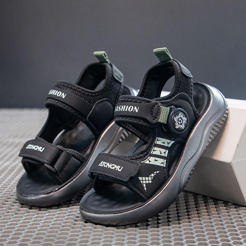 Kinder Drehkopf hübsche Sandalen Sommer 2025 neue Jungen Zehenfrei Mittelalte Ältere Kinder Strandschuhe Mädchen