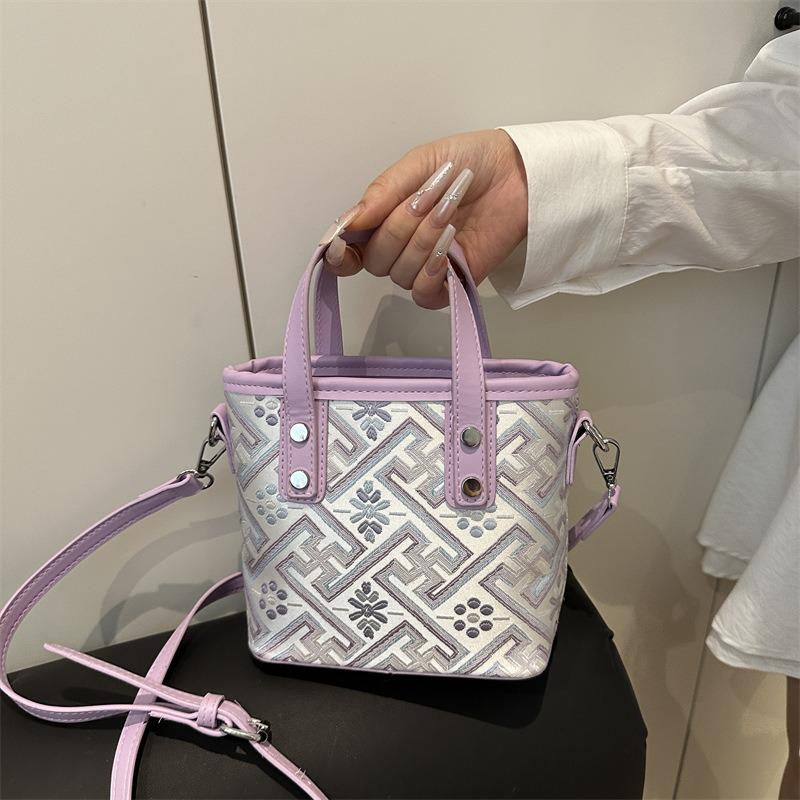 New Wanji pattern portable bucket bag high-end light luxury versatile shoulder messenger bag women