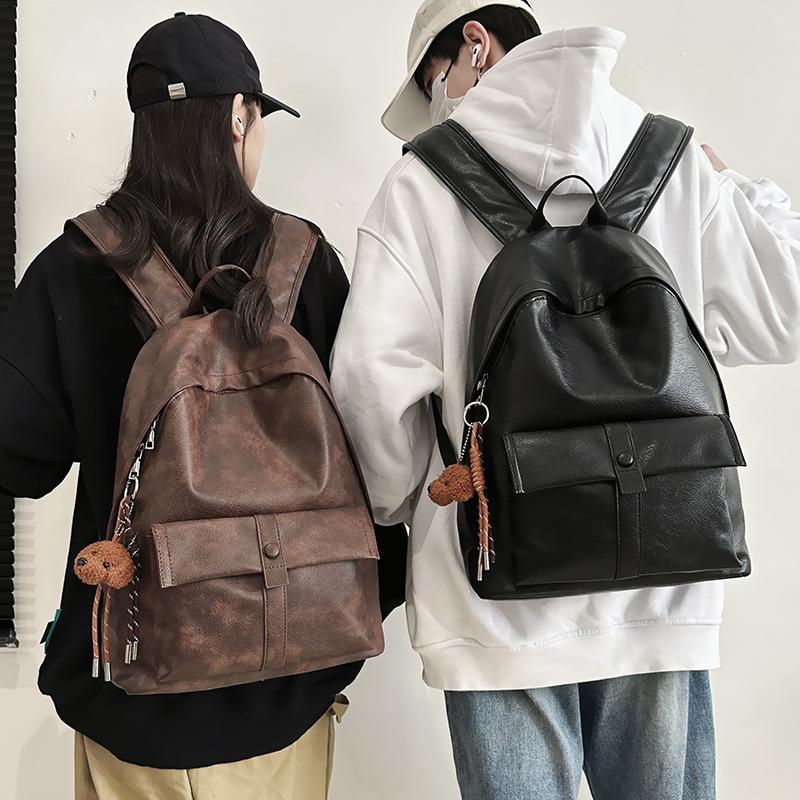Retro schoolbag male college students fashion casual large capacity backpack pu simple female high school students travel backpack tide