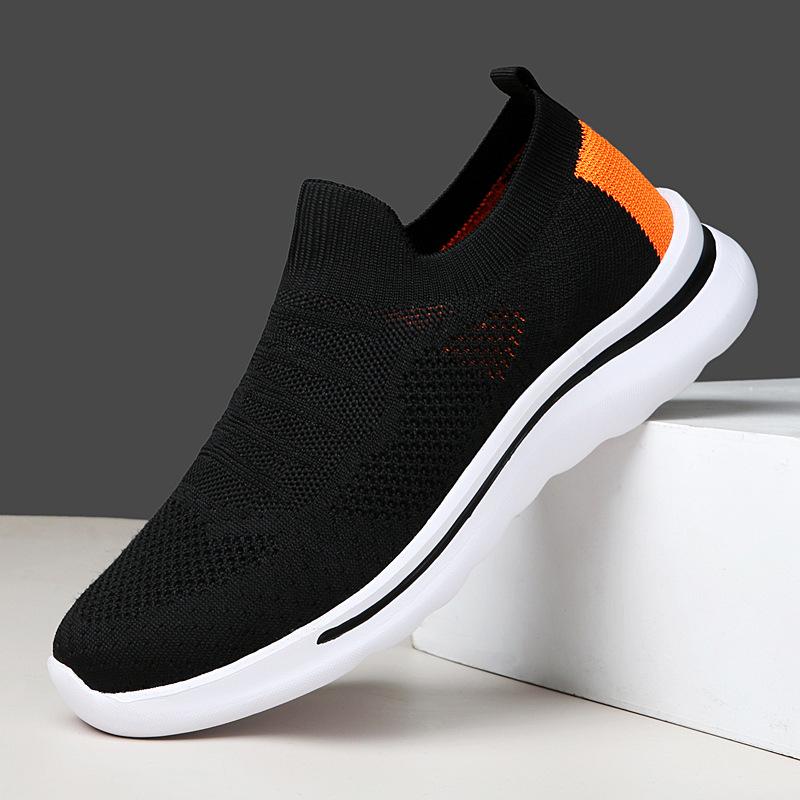 Spring and summer mesh foot health flying weaving breathable walking shoes casual soft sole casual shoes couple shoes