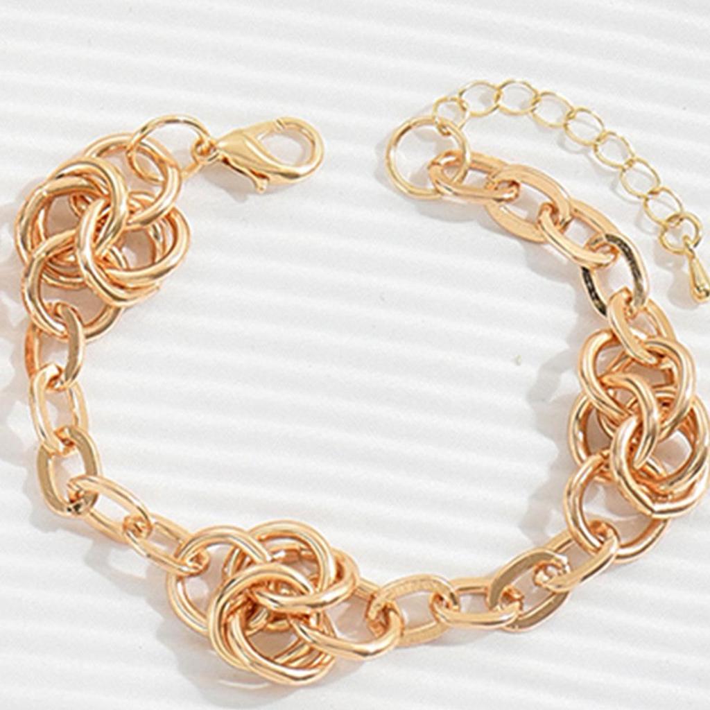 Exquisite Gold Metal Choker Necklace: Elegant Neck Jewelry Set with Matching Bracelet and Earrings.