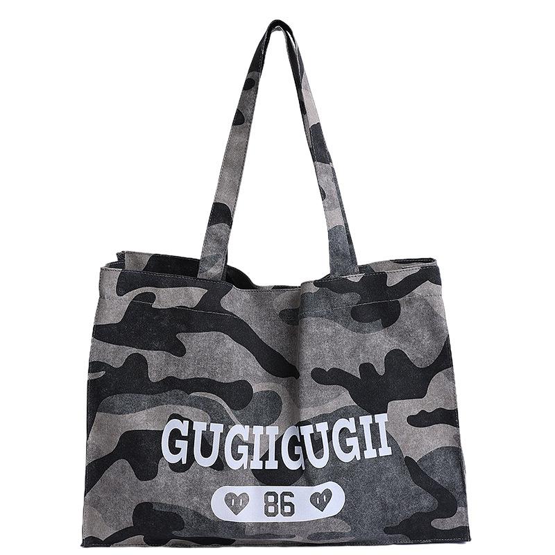

Korean version ins style solid color casual large capacity canvas camouflage tote bag casual leopard print shoulder armpit bag women s bag серый