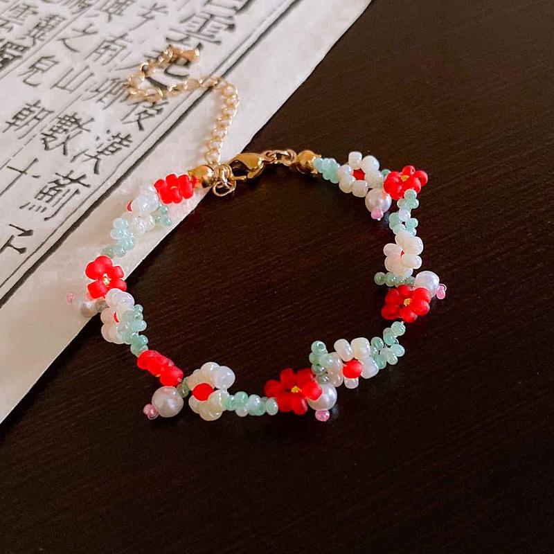 Small fresh flower rice bead pearl bracelet female sweet girl heart bracelet niche simple high-end jewelry