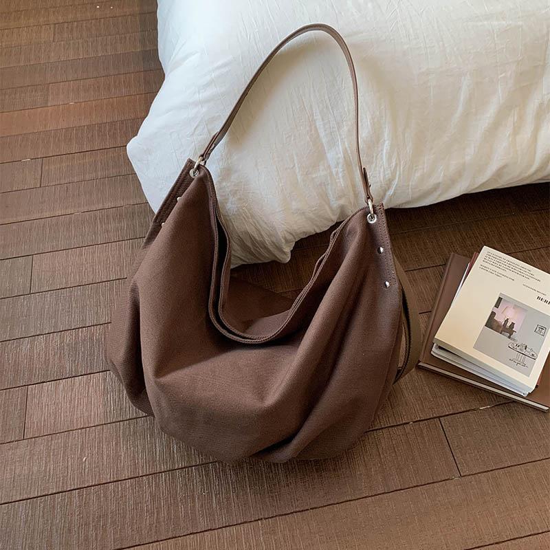 Casual commuting large-capacity canvas bag women's 2025 new lightweight and versatile messenger bag soft shoulder tote bag