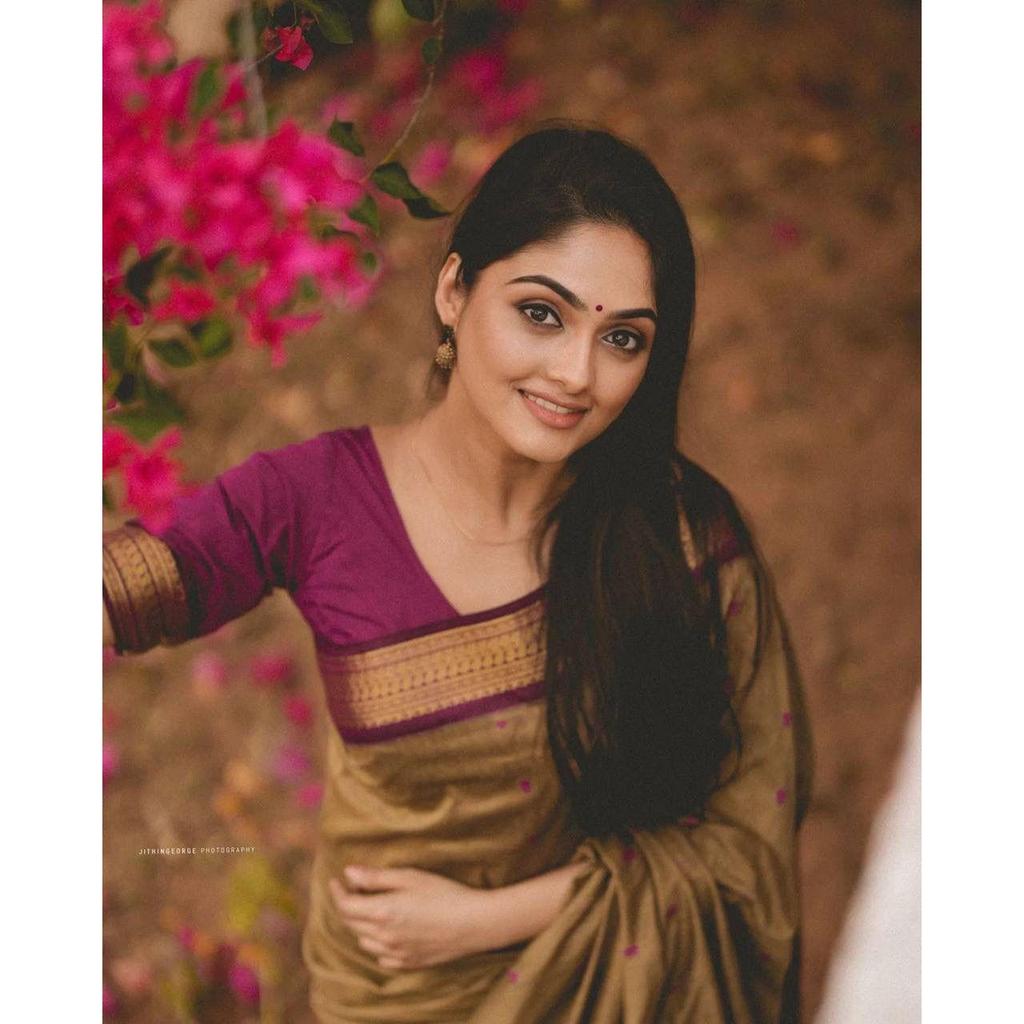 Silk Saree from the ALMAARI Store Is Adorned with Beautiful Zari Work In Form of Traditional Motifs.