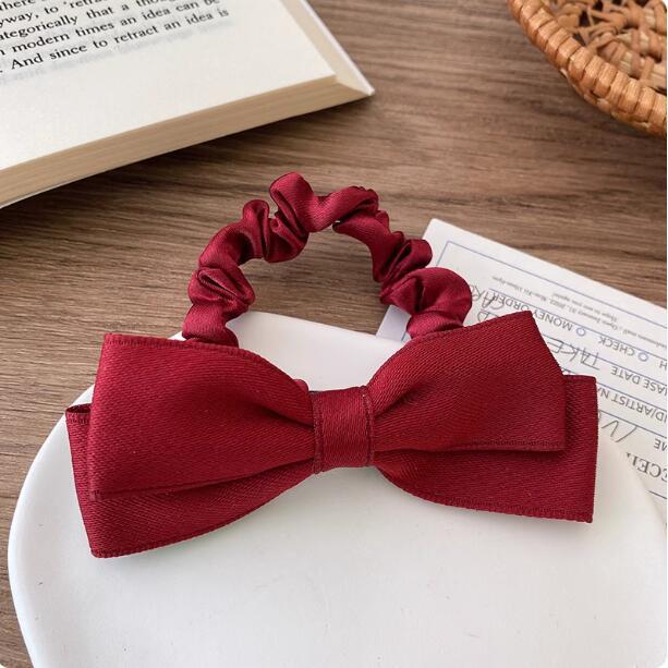 

Черная резинка для волос с бантом для женщин - Элегантный аксессуар для хвостика 2025