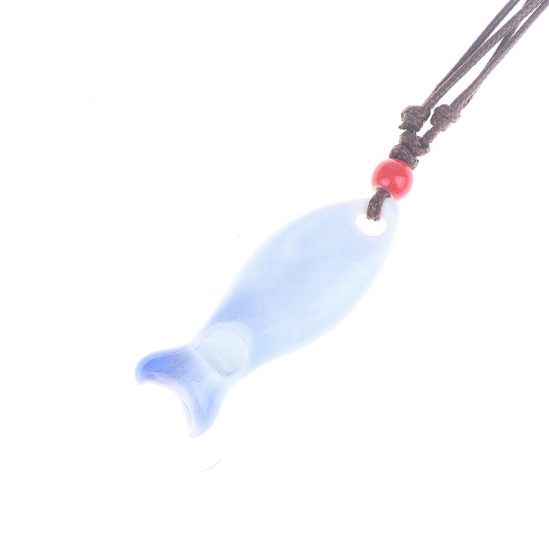 Collane Ciondolo Fischietto Pesce in Ceramica Stile Cinese Fischietto Fatto a Mano Liscio Collana con Fascino Delicato Catena per Maglione Unisex