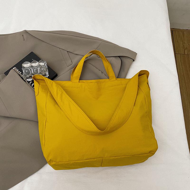 

Корейская версия простой большой вместимости 2025 зима интернет-знаменитость легкая однотонная на плечо женская сумка повседневная ретро сумка для покупок сумочка жёлтый