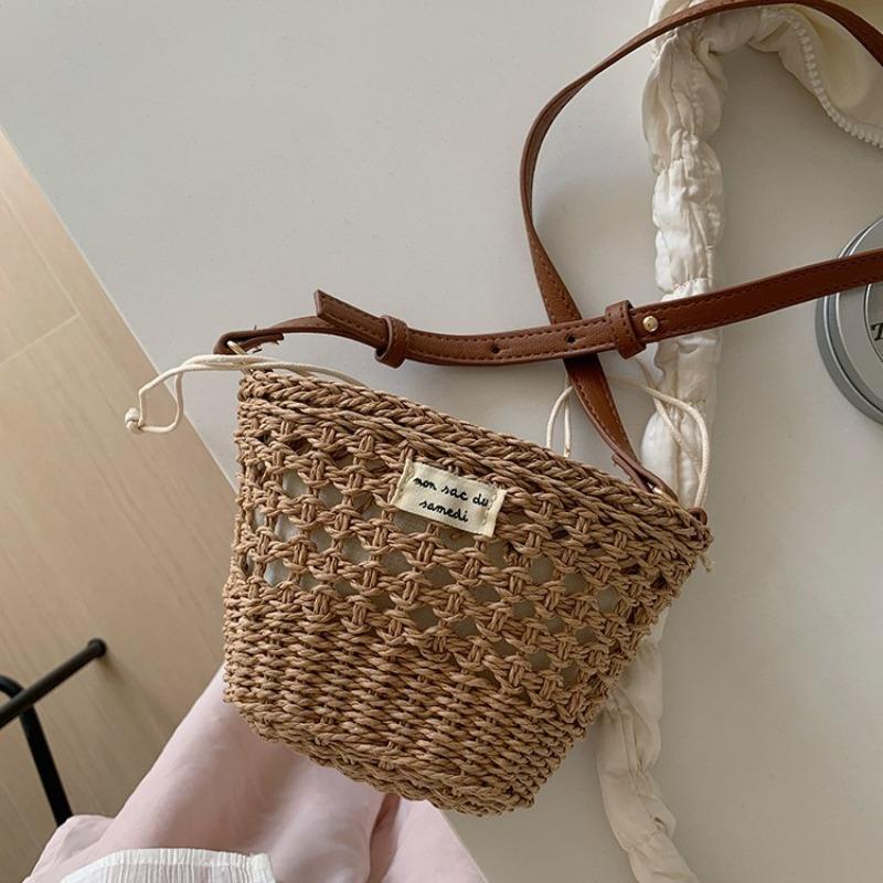 Niche woven bag women's summer new leisure vacation style straw woven bag beach bag mini portable shoulder messenger bag