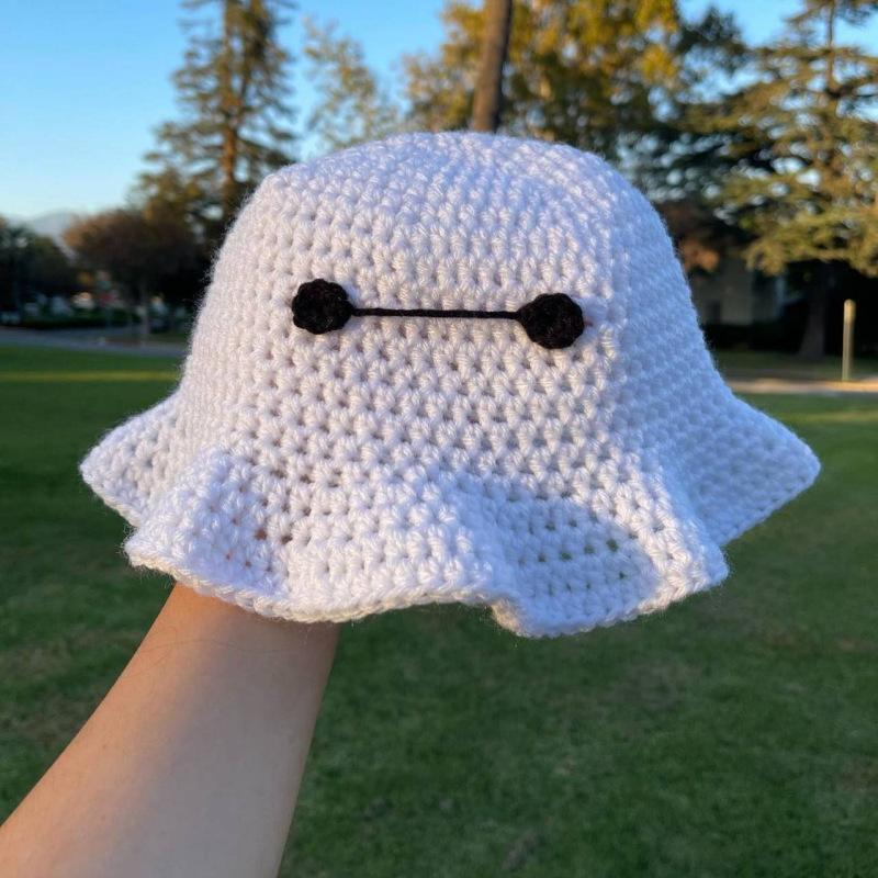 

Новая связанная вручную симпатичная детская шапка цвета кремового мороженого