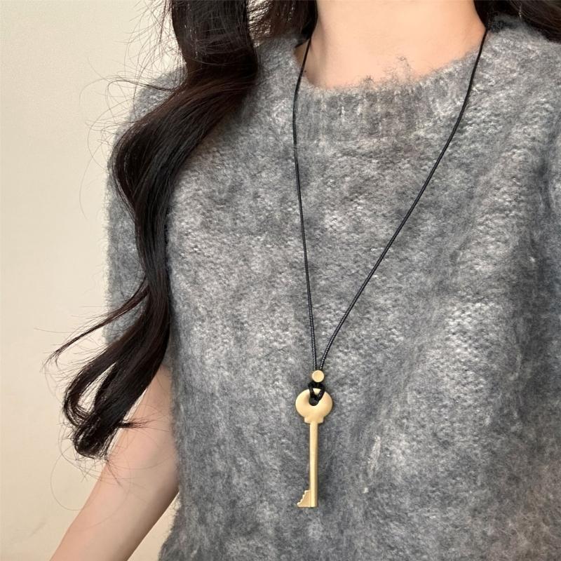Elegant Metal Key Charm Black Rope Necklace Stylish Layering Pieces For Everyday Wear