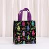 Bolsas StoBag temática navideña bolsas para envolver regalos bolsas para dulces bolsa tote de material no tejido negra colorida para empaquetar caramelos golosinas