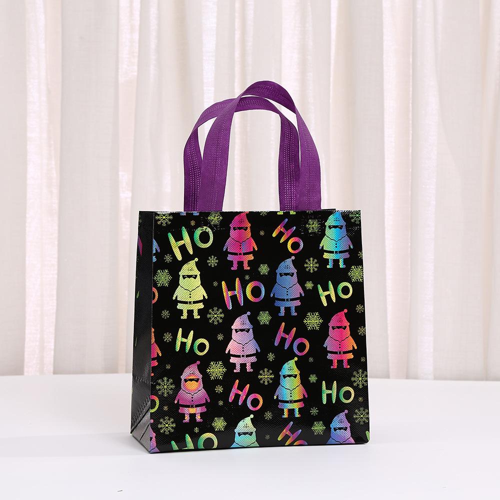 Bolsas StoBag temática navideña bolsas para envolver regalos bolsas para dulces bolsa tote de material no tejido negra colorida para empaquetar caramelos golosinas