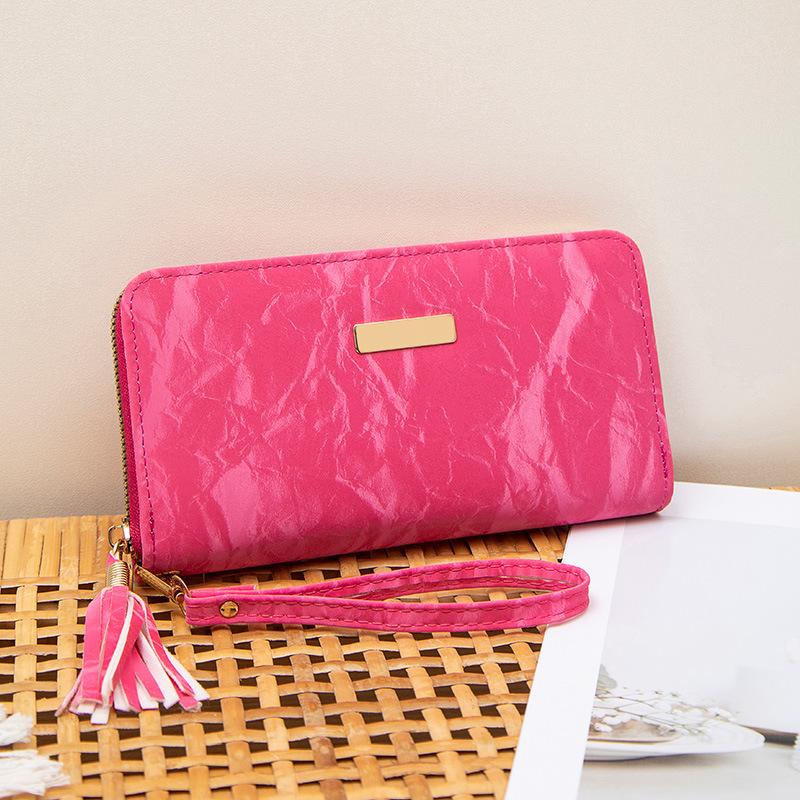 Spring and summer new simple multi-card position hand-held women's bag, fringed zipper, long wallet, and a wallet.