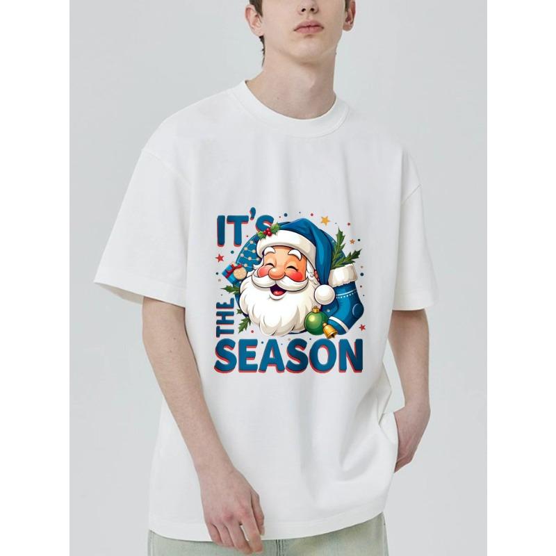 Christmas T-Shirt Black Santa Claus With It's The Season Text And Holiday Decorations For Festive Season