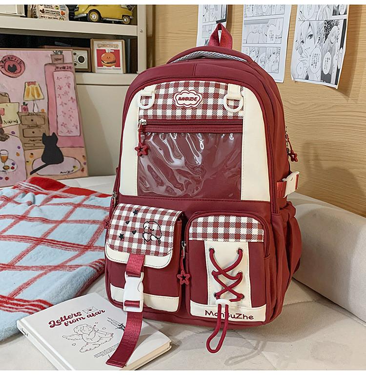 Cartoon Girls Backpack With Nylon Material And Padded Shoulder Straps For School Use