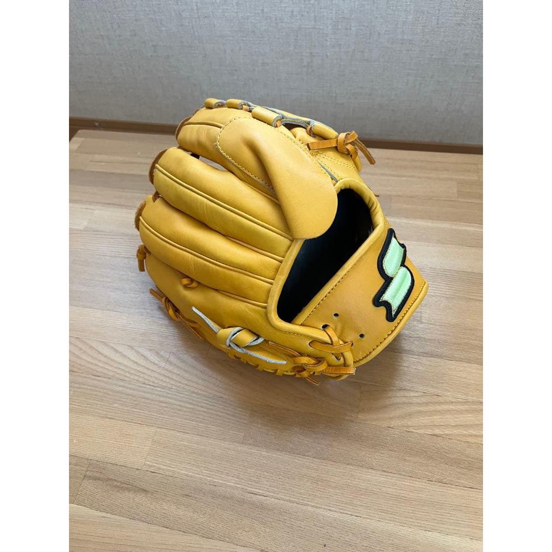 Used SSK yellow leather hard glove for right-handed thrower