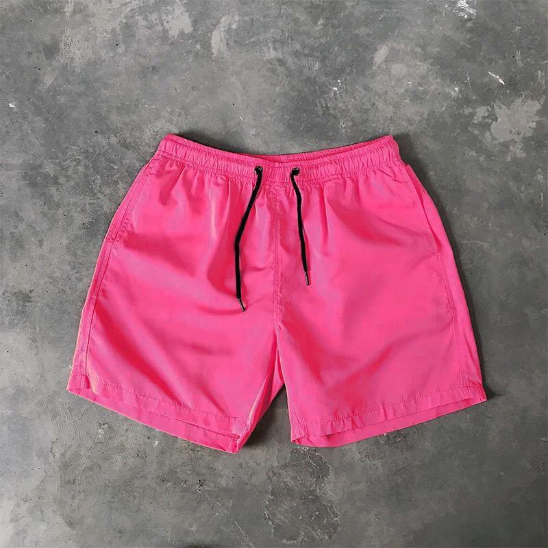 Letnie męskie spodenki casualowe Cukierkowe kolorowe spodnie Five Quarter męskie sportowe luźne szybkoschnące cienkie spodnie plażowe spodenki męskie