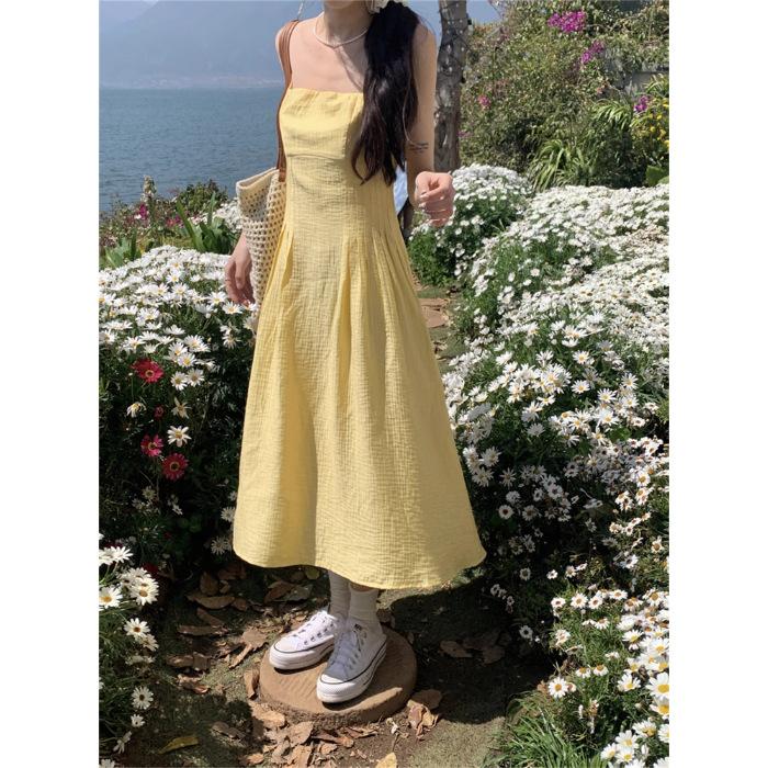

Seaside vacation super beautiful yellow suspender dress women s summer travel Thai gentle wind waist French long skirt S